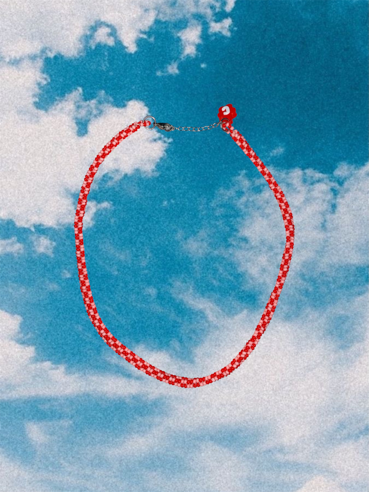 Collar caramelo rojo y rosa